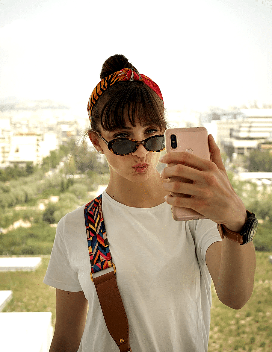 Portrait photo of a girl taking a selfie